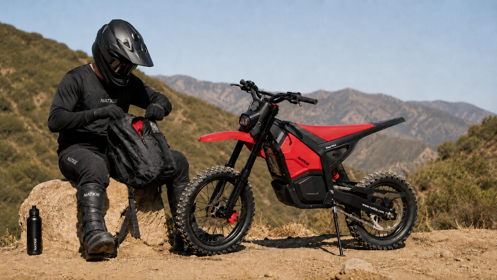 first OHV trail ride rider geared up with helmet and backpack at trail