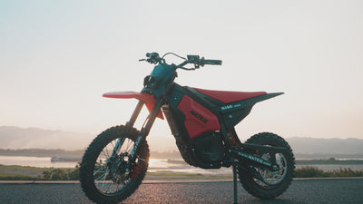 NATKIE RISE Mini electric dirt bike in action on off-road terrain, built for younger riders with smooth control, stable handling, and electric dirt bike performance.
