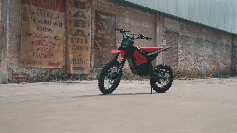 NATKIE RISE Core electric dirt bike charging through off-road terrain in a cinematic hero video, highlighting speed, power, and adventure.